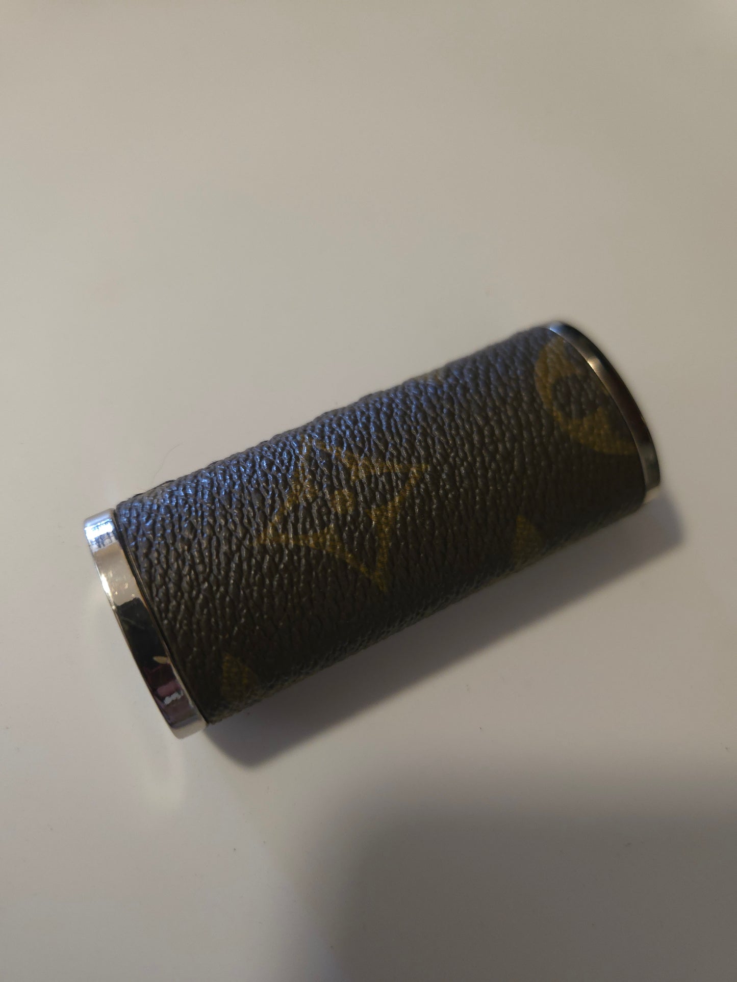 Upcycled hand sewn lighter case.