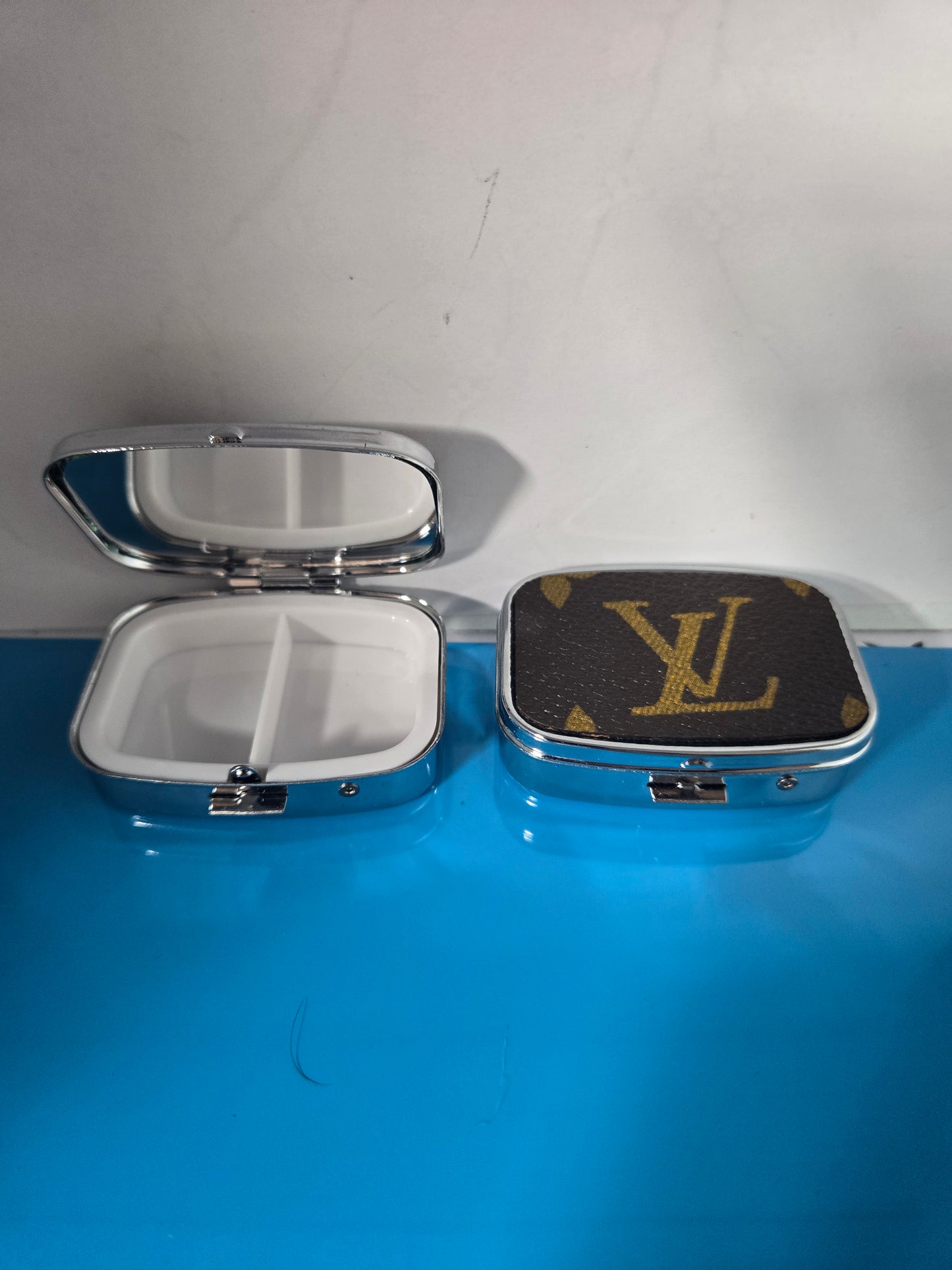 Small upcycled multi use pill case.