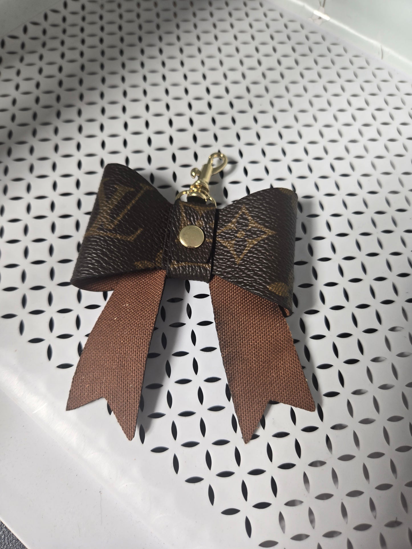 Upcycled bow charm