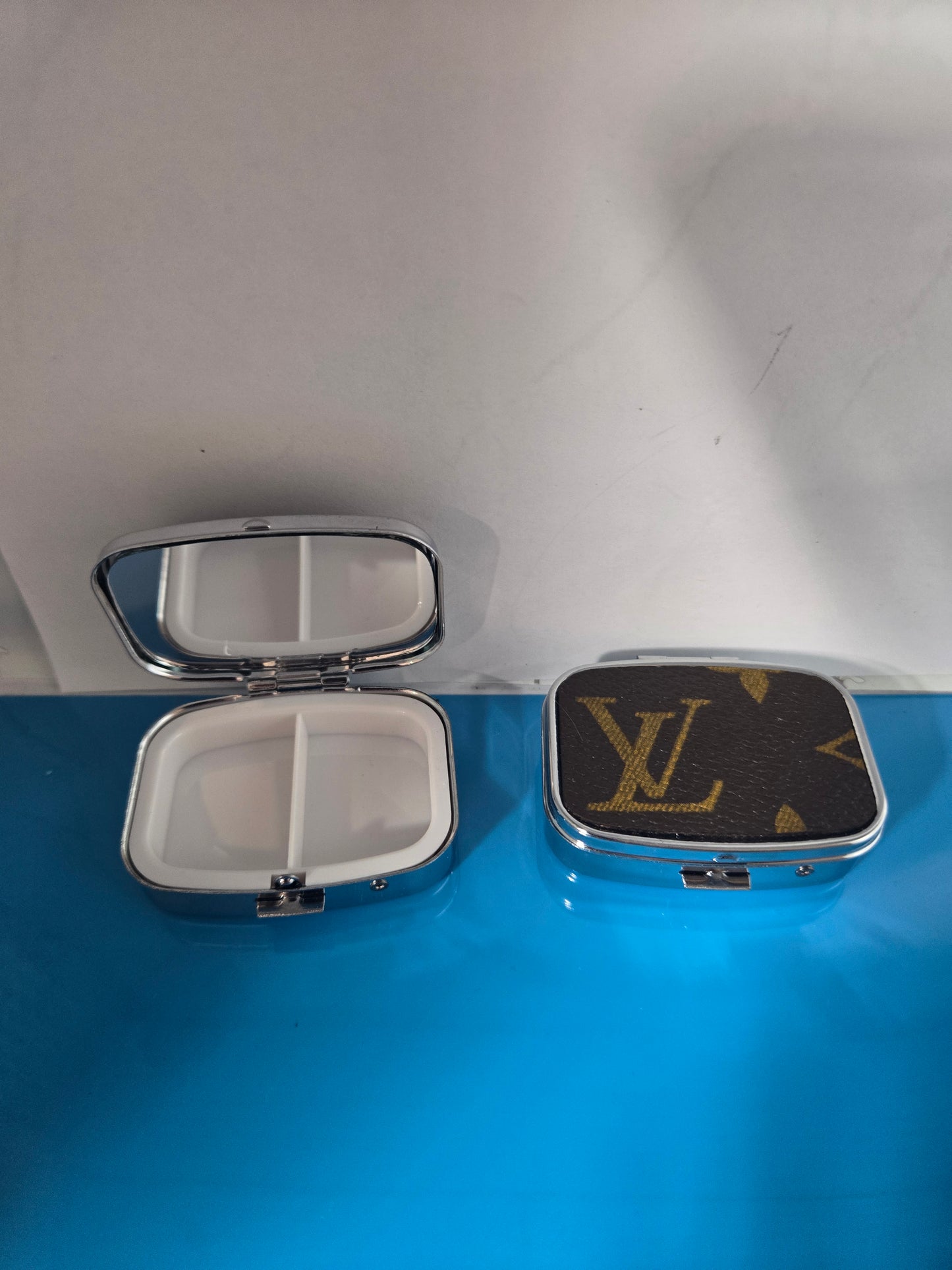 Small upcycled multi use pill case.