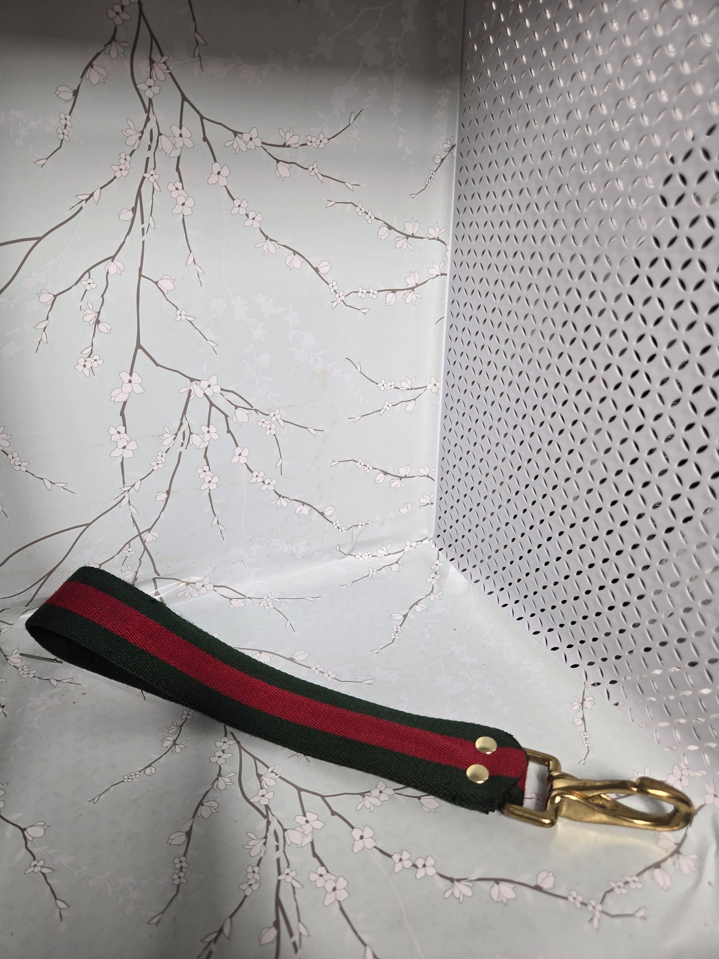 Upcycled green and red stripe wristlet