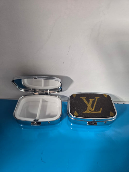 Small upcycled multi use pill case.