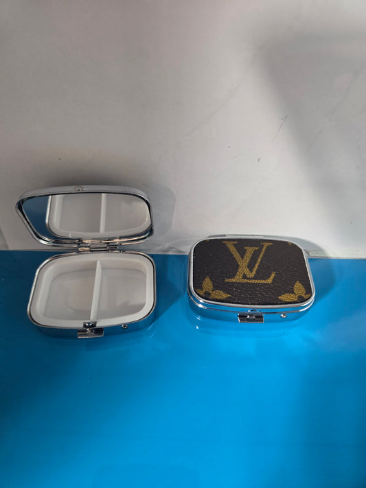 Small upcycled multi use pill case.