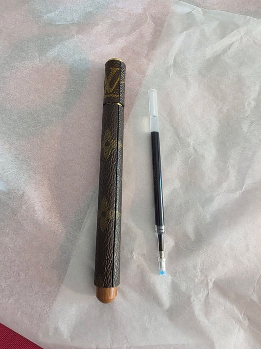 Upcycled rosewood and brass with cap done also, ( 1 refill)