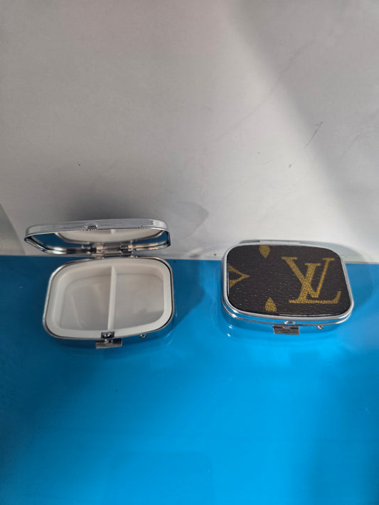 Small upcycled multi use pill case.