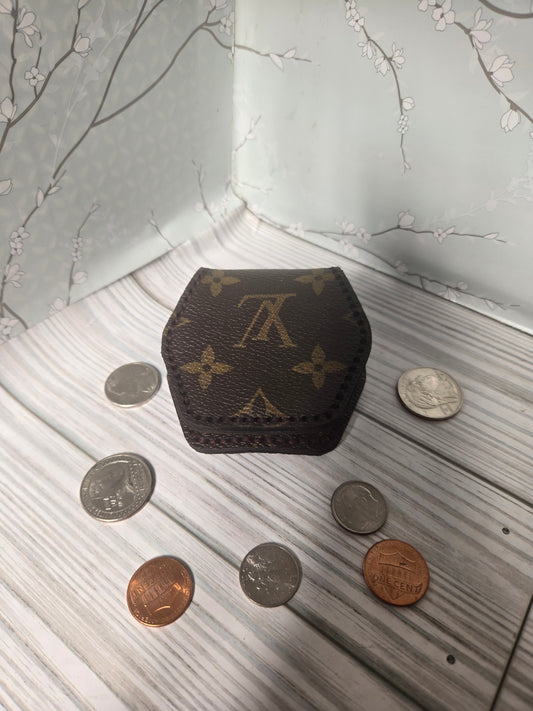 Upcycled handmade hand-sewn coin pouch.