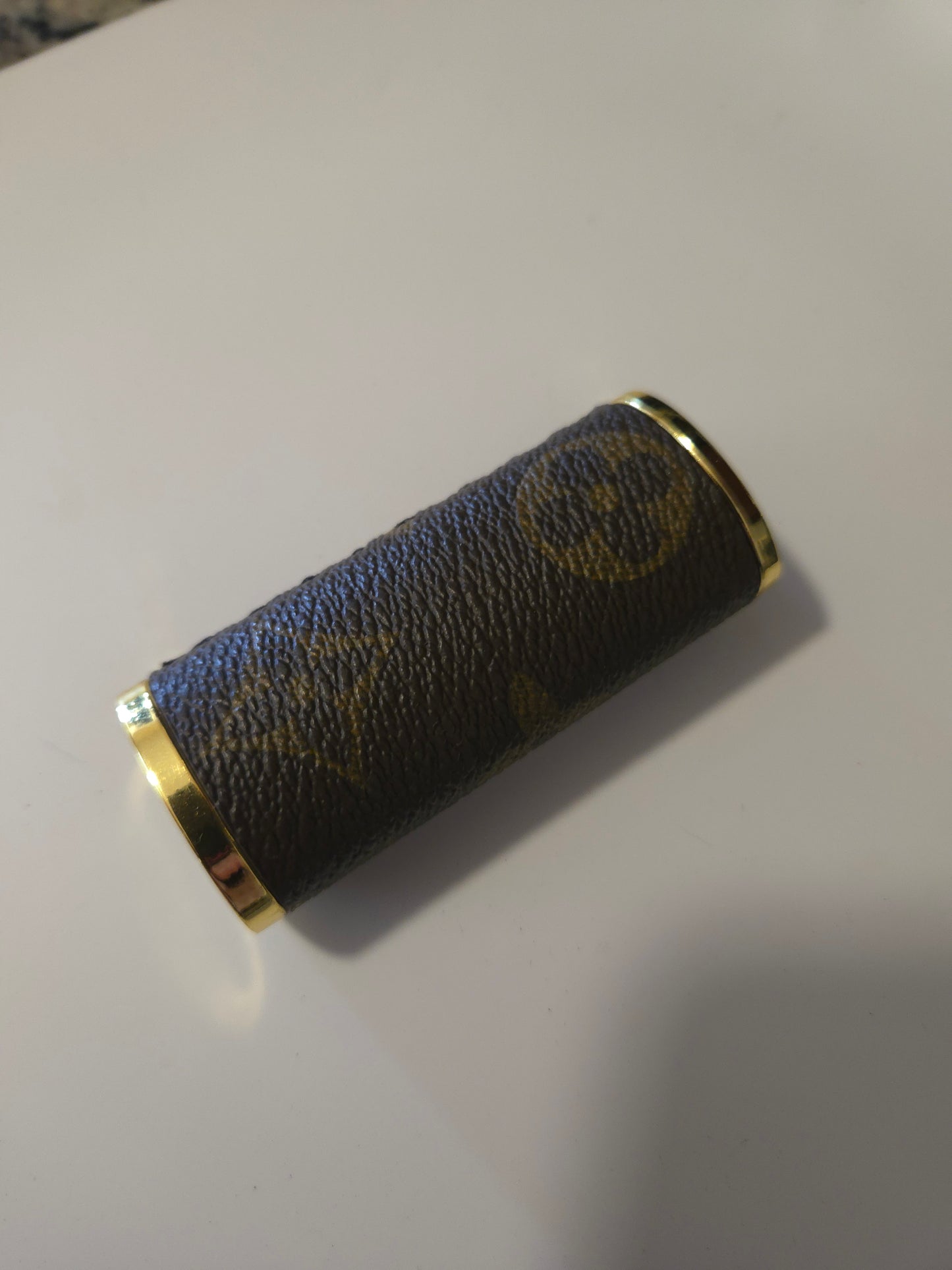 Upcycled lighter case fits normal Bic lighter.  Hand sewn.