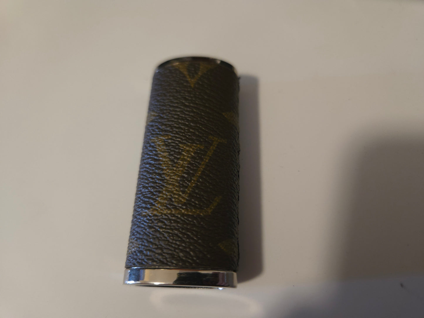 Upcycled hand sewn lighter case.
