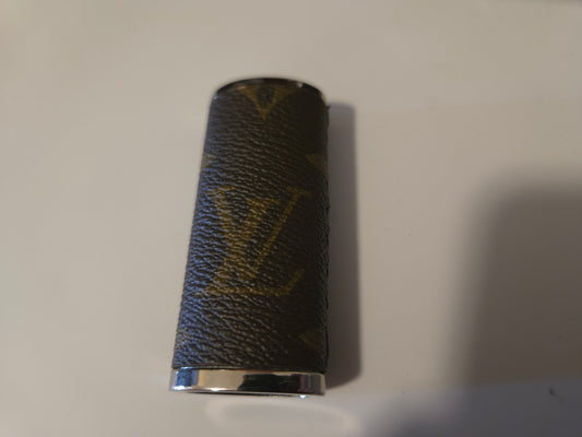 Upcycled hand sewn lighter case.