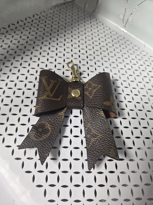 Upcycled bow charm