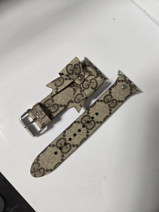 Upcycled watchband with upcycled bow.