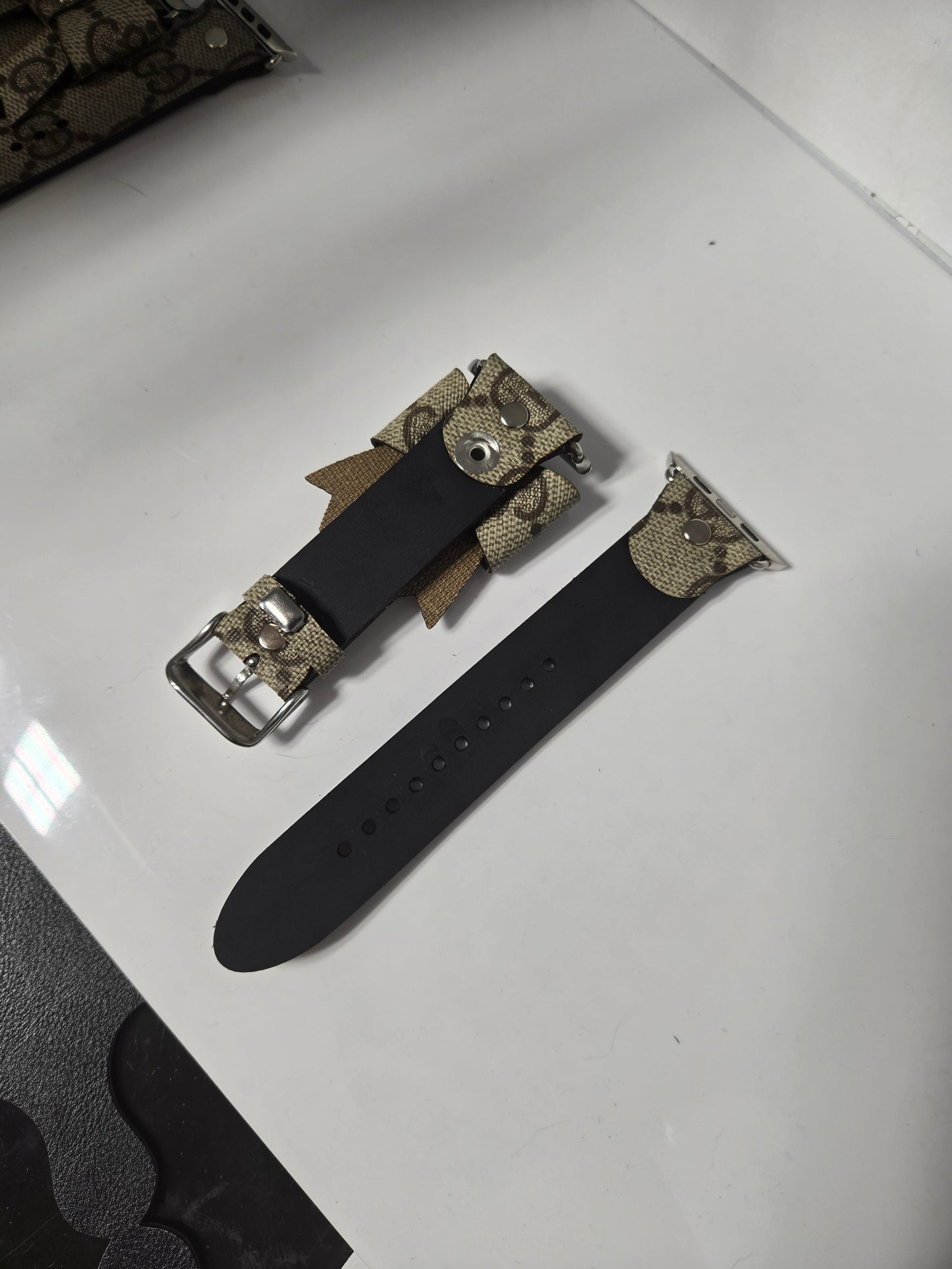 Upcycled watchband with upcycled bow.