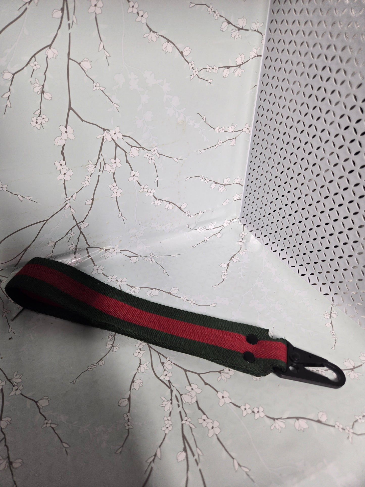 Upcycled green and red stripe wristlet