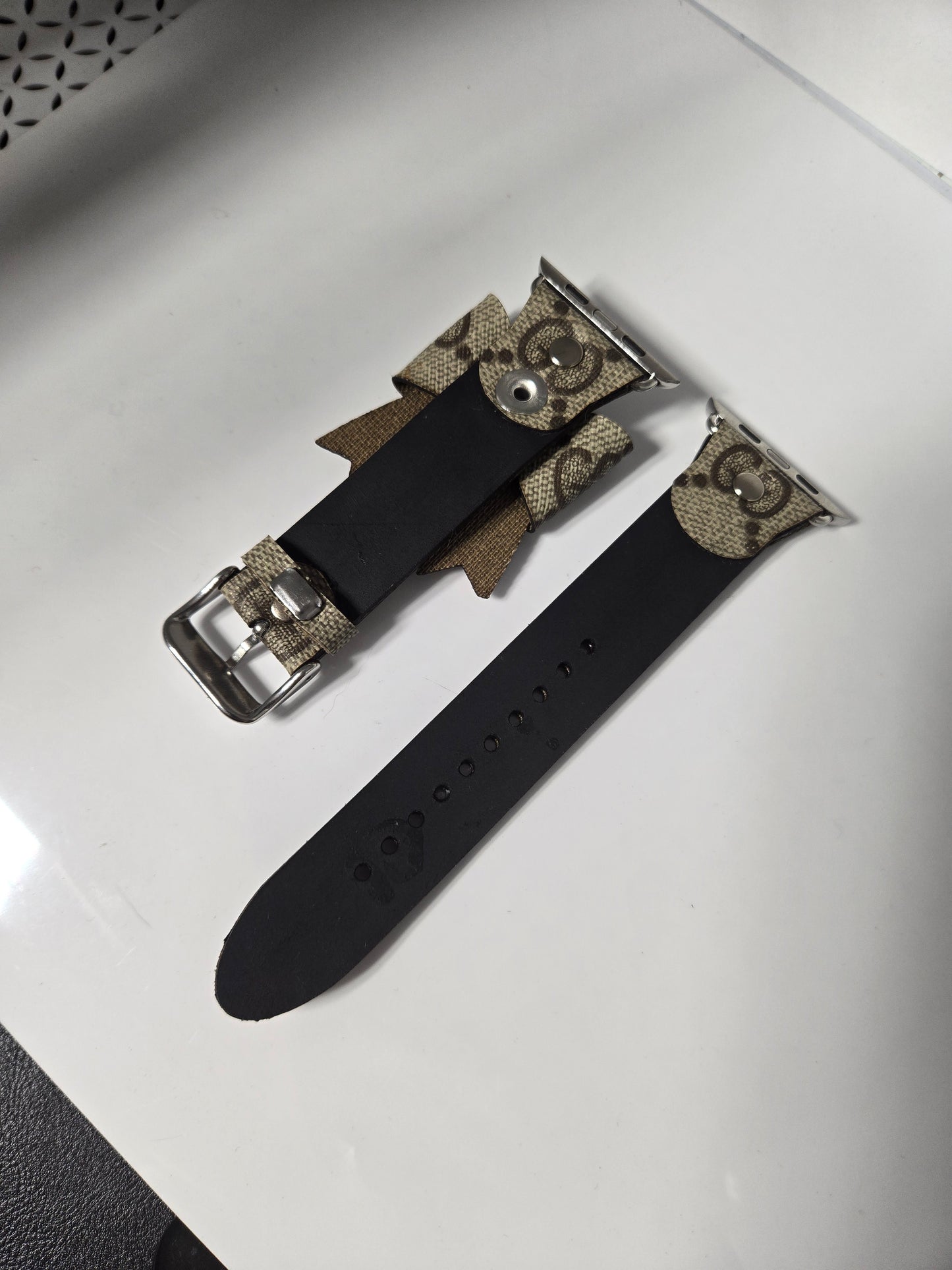 Upcycled watchband with upcycled bow.