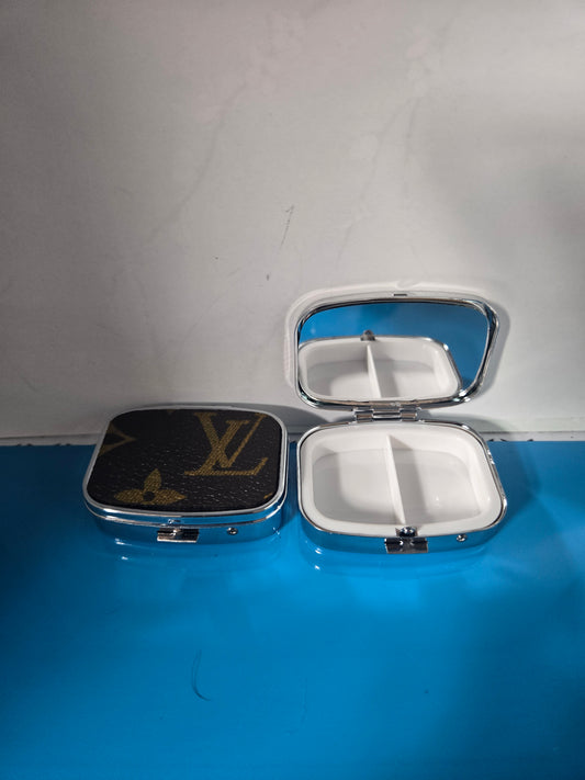 Small upcycled multi use pill case.