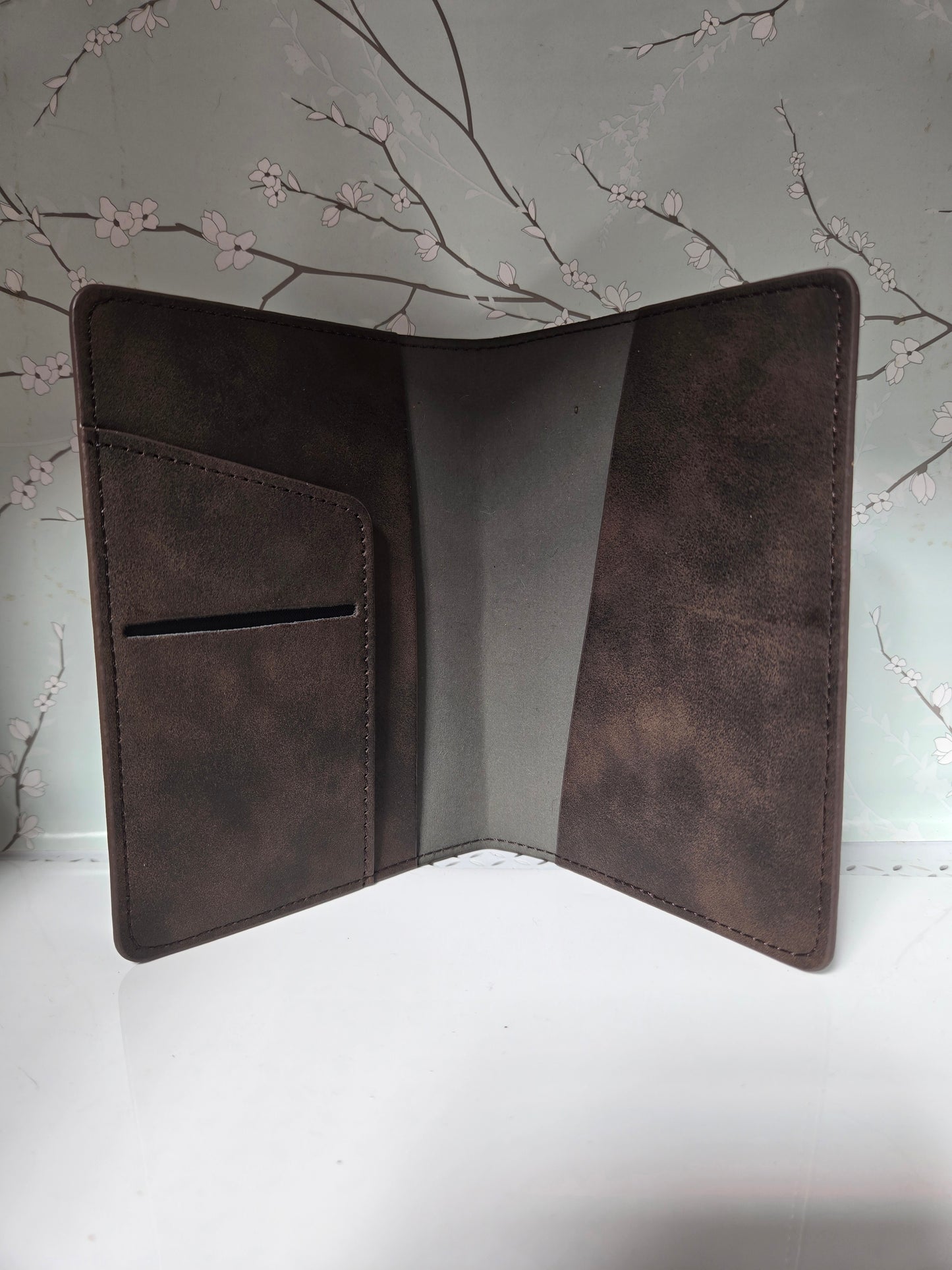 Upcycled engraved leather passport cover