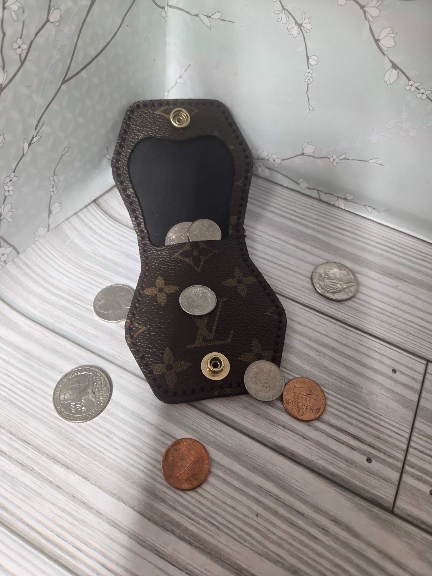 Upcycled handmade hand-sewn coin pouch.