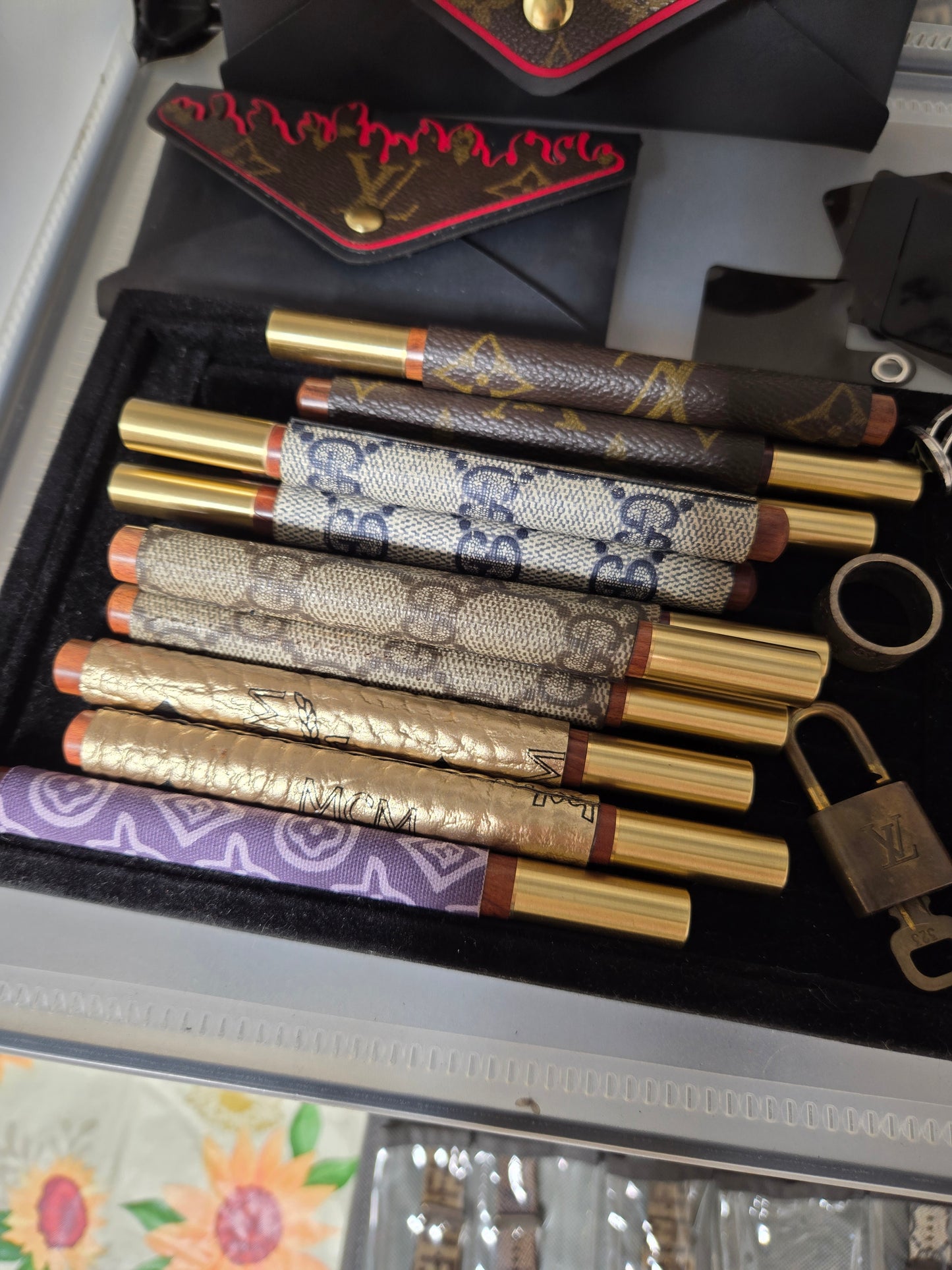 13 upcycled wristlets and 11 upcycled pens bundle