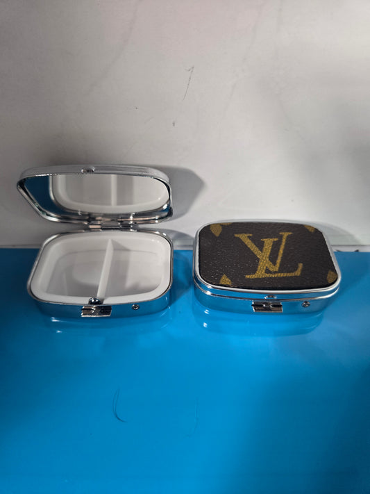 Small upcycled multi use pill case.