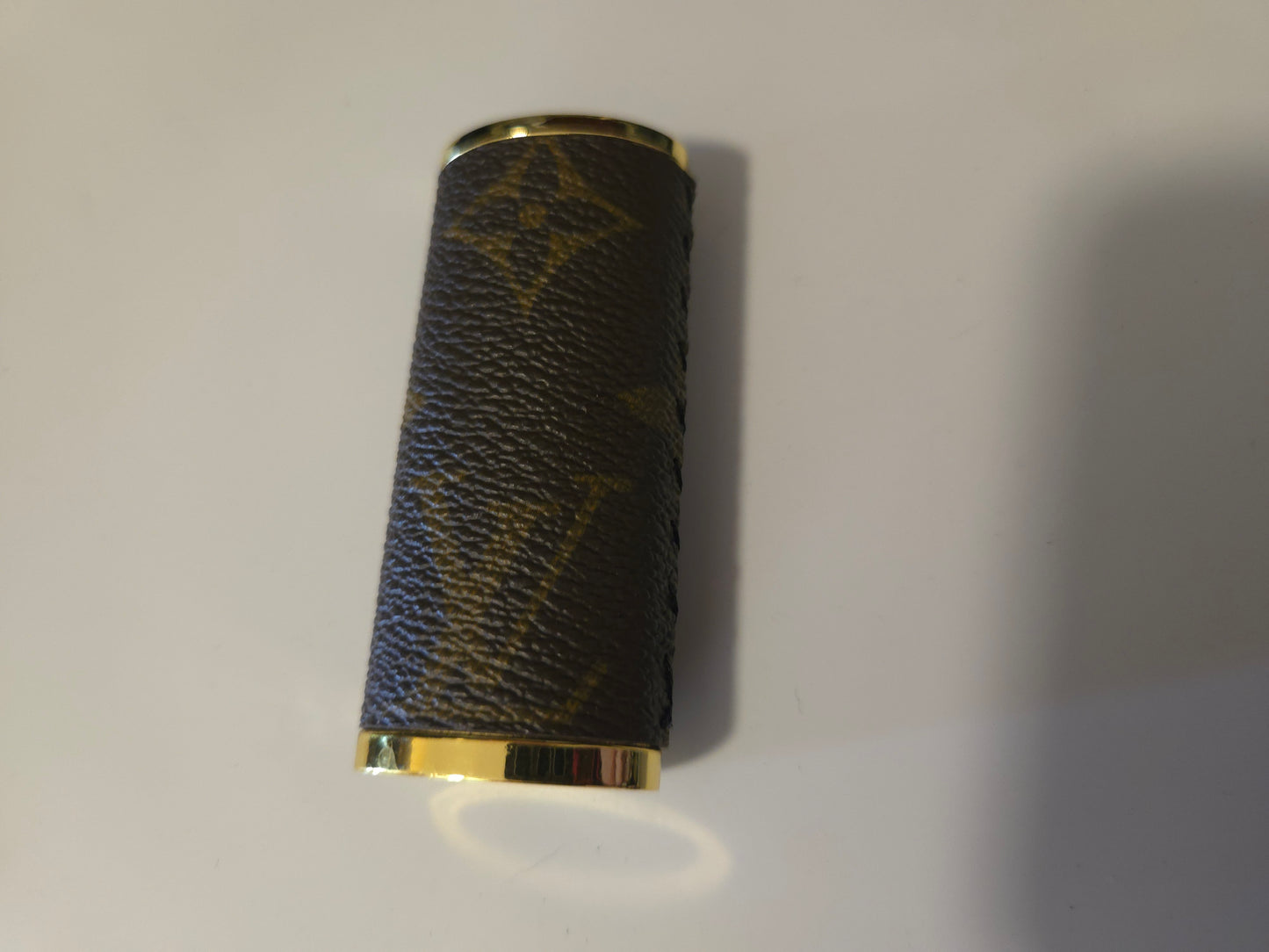 Upcycled lighter case fits normal Bic lighter.  Hand sewn.