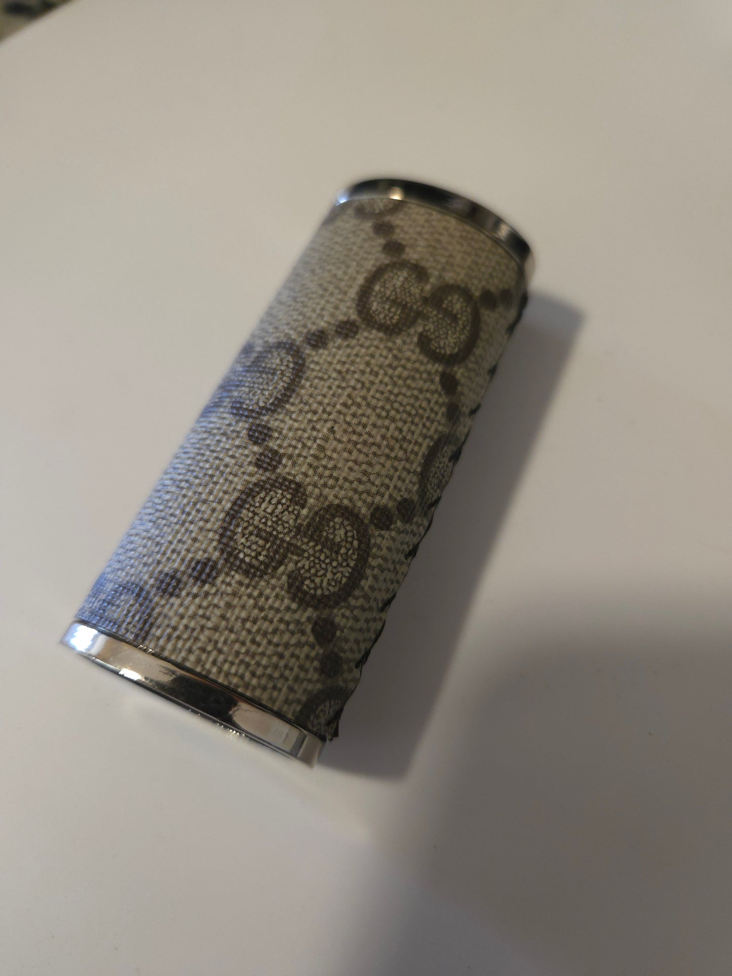 Upcycled hand sewn lighter case.