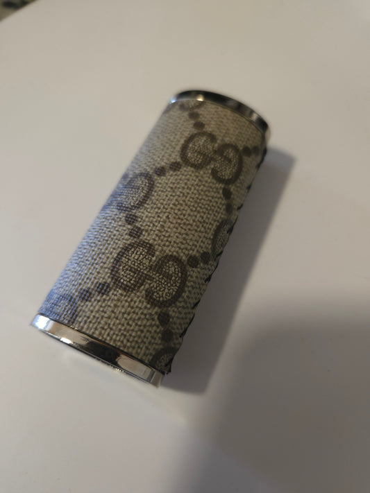 Upcycled hand sewn lighter case.