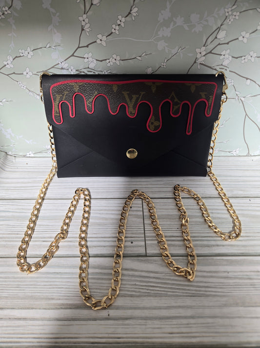 Handmade upcycled leather crossbody with chain