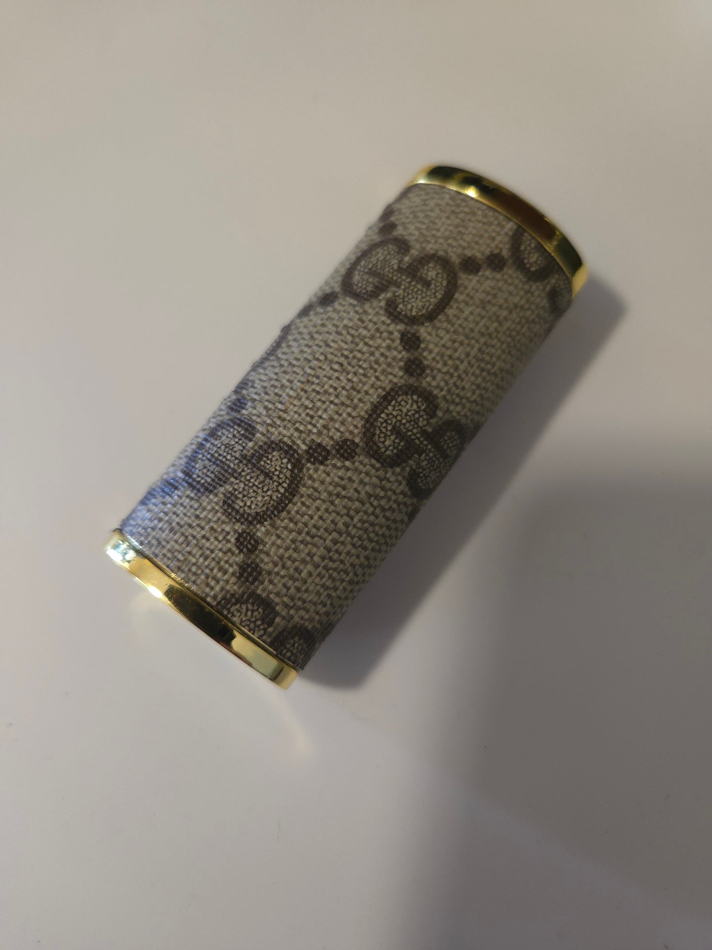 Upcycled lighter case fits normal Bic lighter.  Hand sewn.
