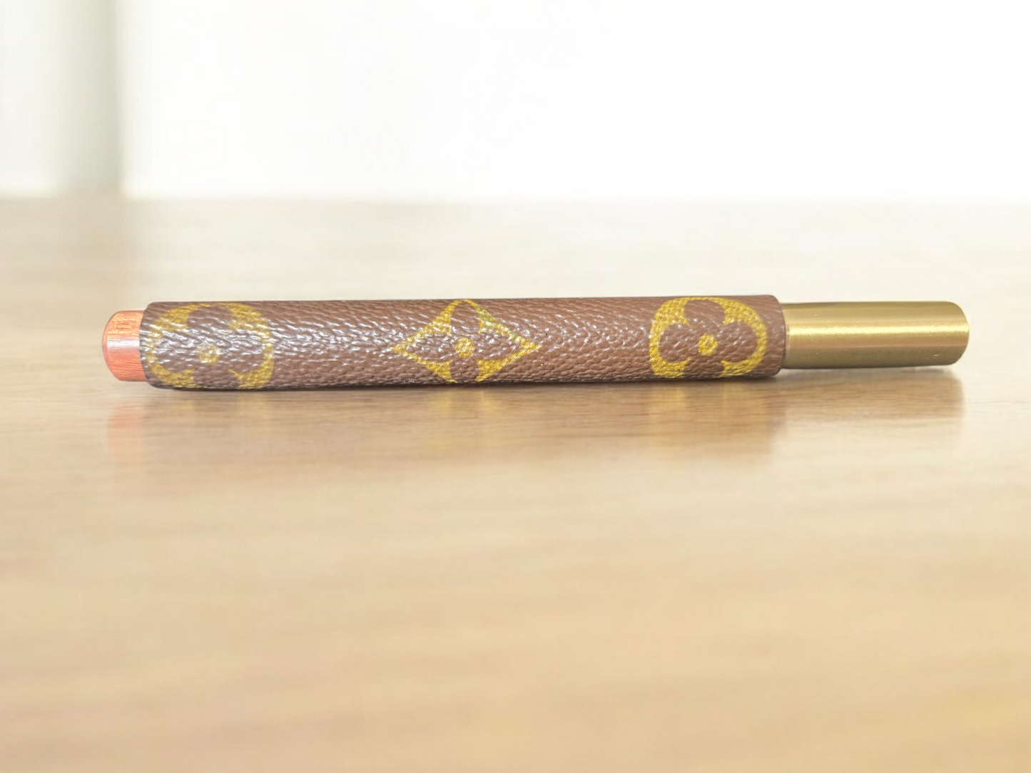 Upcycled rosewood and brass pen plus one refill.