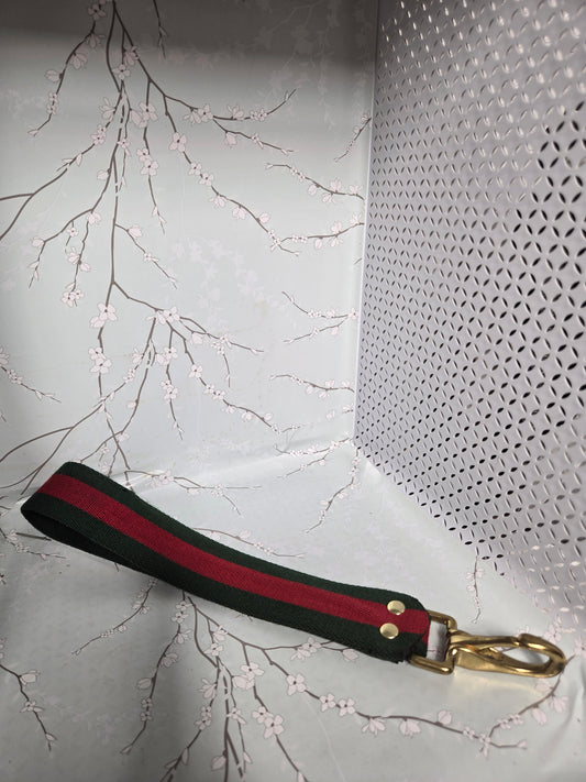 Upcycled green and red stripe wristlet