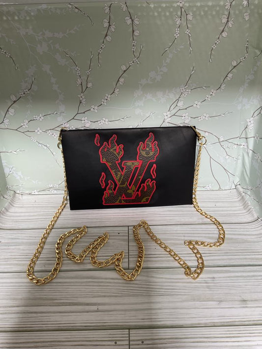 Handmade upcycled leather crossbody with chain